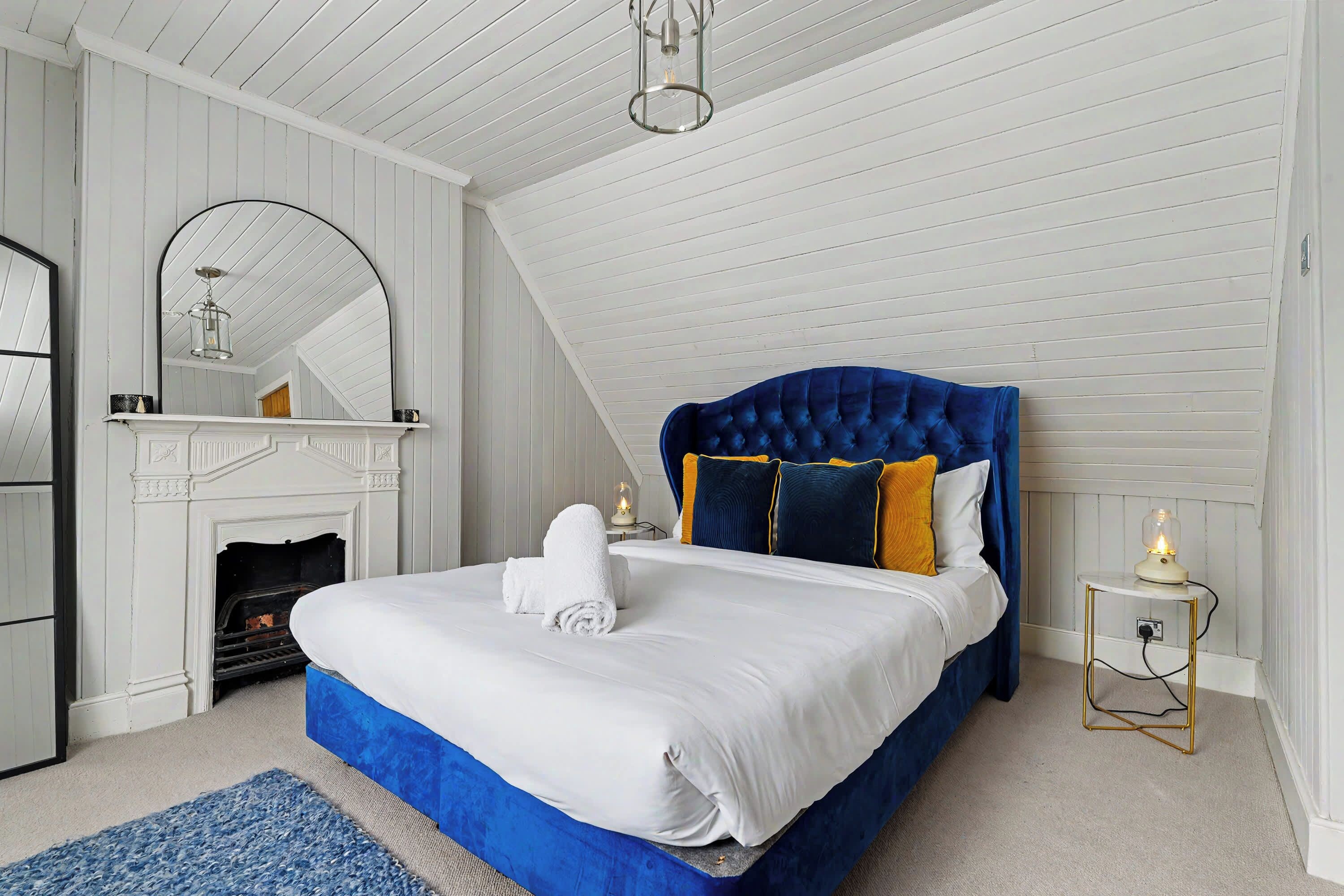 Master bedroom with a comfy king size bed.