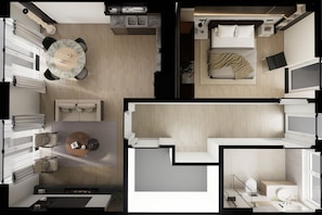 Ein modernes Hotelzimmer mit Bett, Nachttisch und einem Badezimmer mit Dusche und Toilette.