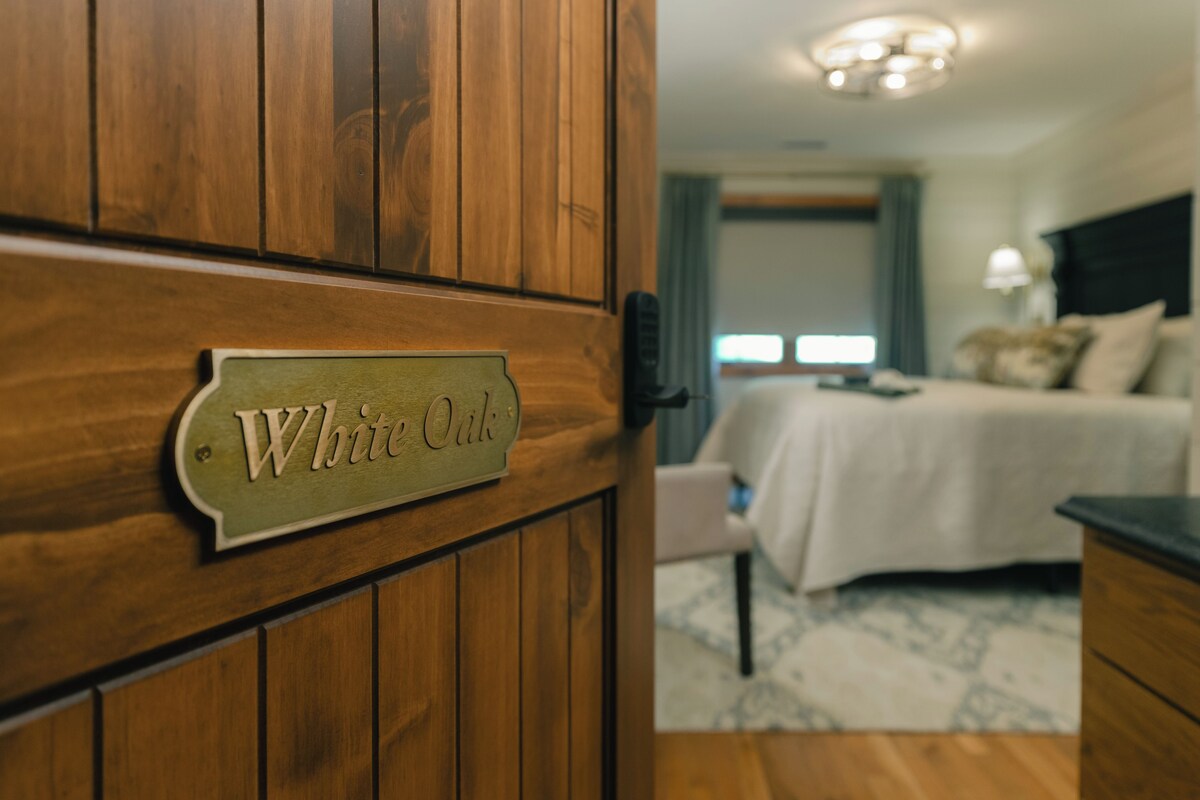 A wooden door with a sign that reads 'White Oak'.