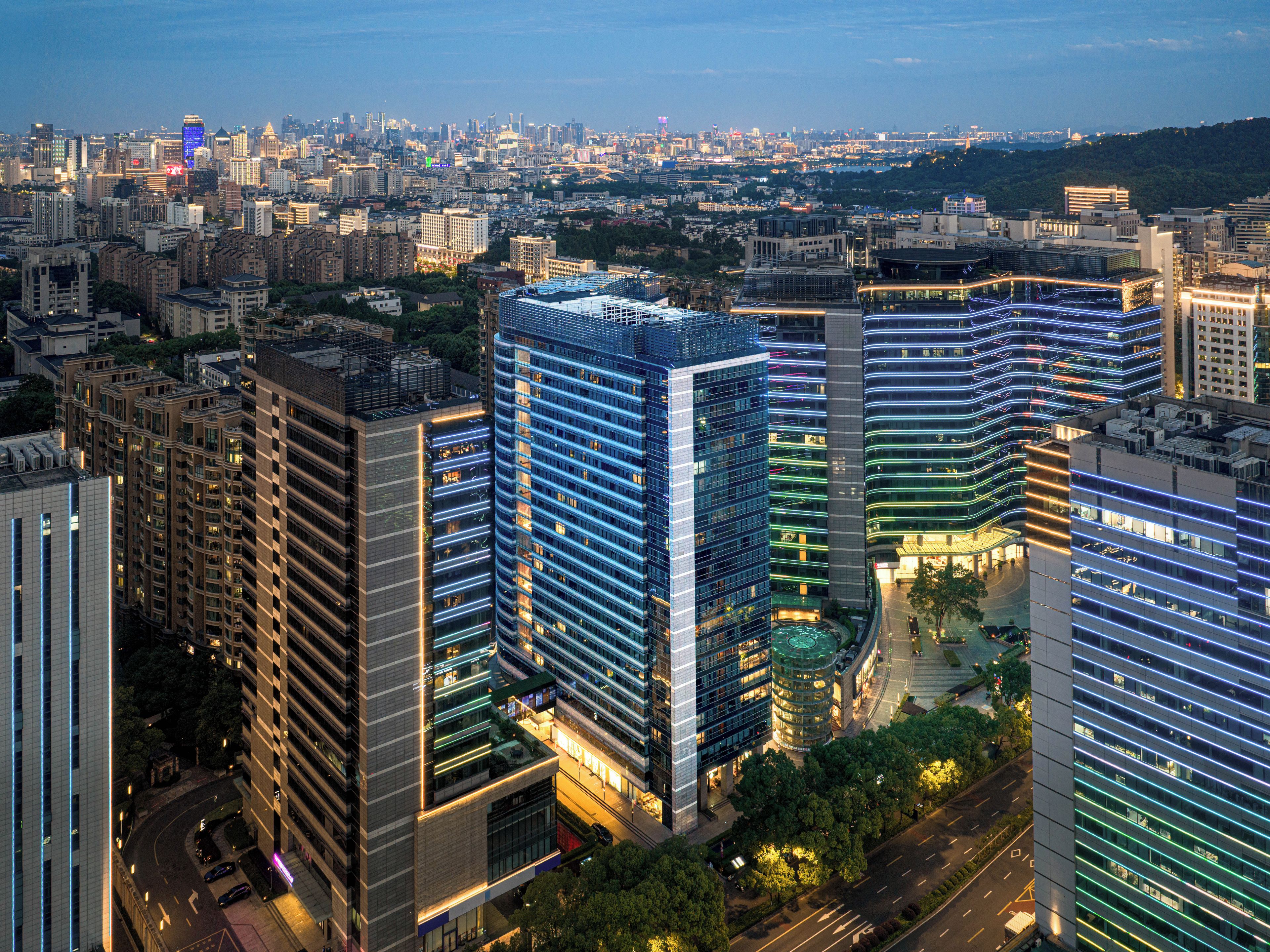 A high-rise building with multiple floors and a modern architectural design.