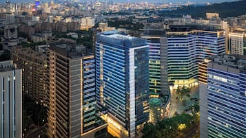 A high-rise building with multiple floors and a modern architectural design.