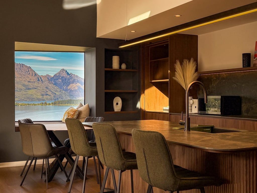 Gather around the beautiful timber dining table, with stunning lake and mountain views as your backdrop.