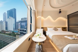 A hotel room with a city view, a bed, a bedside table, and a modern ceiling design. - Chongqing Nanqing World Time Hotel (Chongqing)