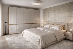 Quarto com cama grande, guarda-roupa e parede texturizada.