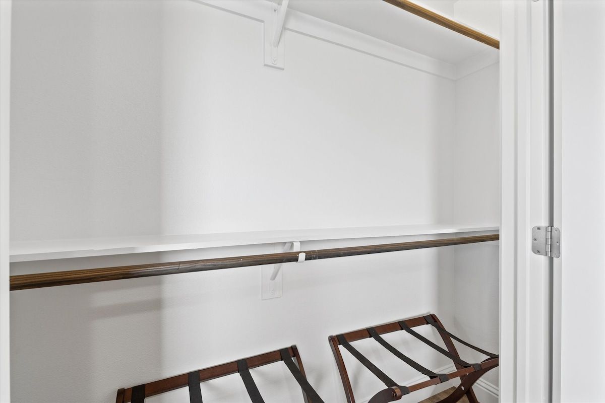 Primary closet. Luggage Racks.