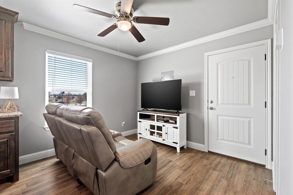 Studio Style Living room. Recliners 55" Smart HDTV. 