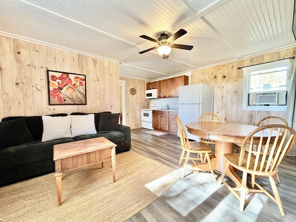 Living area - Cozy Chalet #9/ Heated Pool/ Close To Beach/ On Site Activities! (Brackley Beach)