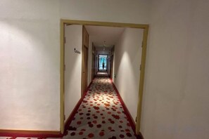 A hallway with a carpeted floor and a door labeled 'Lobby'. - Jiahe Liyuan Hotel (Beijing Tongren Hospital Beijing Railway Station) (Beijing)