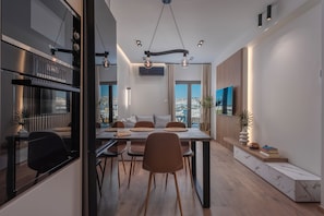 Open-Plan Living and Dining Space - Deluxe Vista Castello - Elegant Sky-High Apartment with Stunning Views (Thessaloniki)