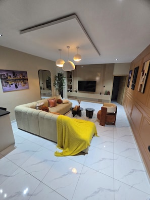 Living area - Royal Crowns Apartments. Cosy 2 bedroom ground floor flat in secure estate (Lagos)