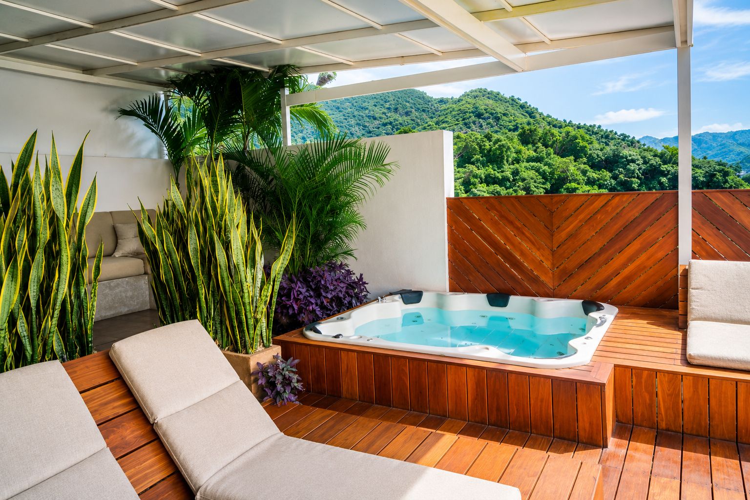 A wooden deck with a hot tub, lounge chairs, and potted plants.