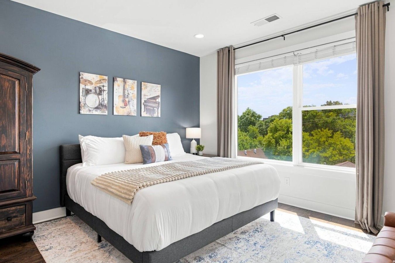 Bedroom 4 is on the top floor and has a king bed, Smart TV, and ensuite bathroom.