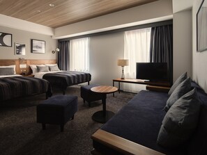A hotel room with two beds, a sofa, a TV, and a small table. - THE KNOT YOKOHAMA (Minamisaiwai, Nishi-ku, Yokohama-shi,)