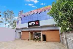 A hotel named 'OYO Ashoka' with a signboard advertising 24-hour service. - Hotel O Ashoka (Chandrapur)