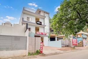 A multi-story building with a sign for 'OYO' and 'HOTEL SECOND HOME RESIDENCY'. - Hotel O by OYO Second Home Residency (Dehradun)