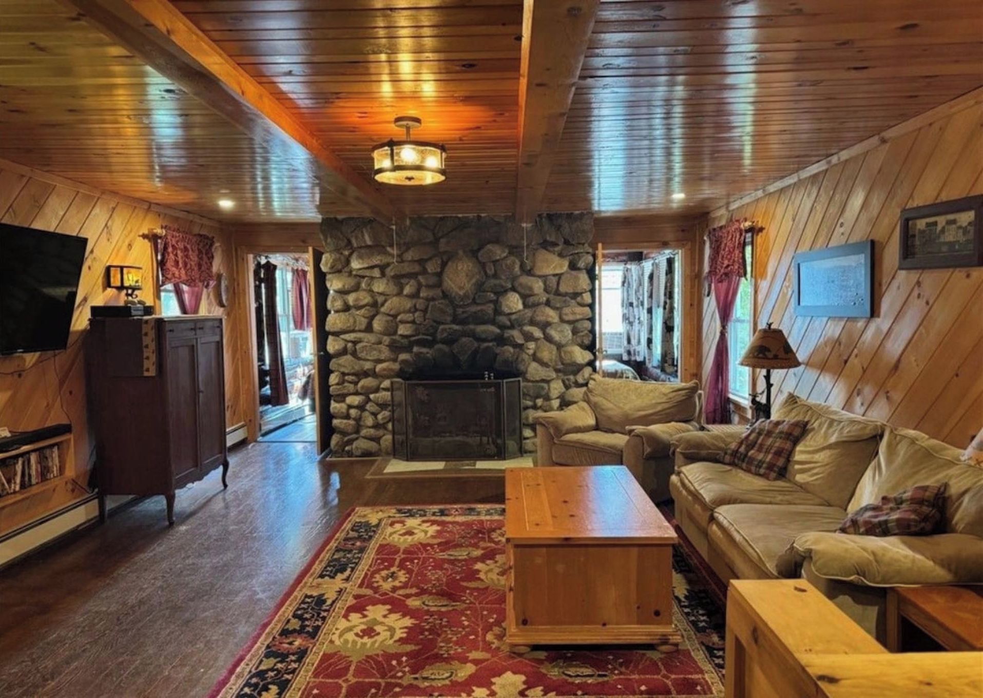 Cozy living room area with a smart TV, xbox, nintendo switch 2, and board games