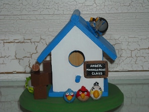 A birdhouse with a sign that reads 'ANGER MANAGEMENT CLASS' and two Angry Birds figurines in front. - ULX Migration ES Mobile Test GL (Conroe)