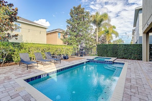 A swimming pool with lounge chairs and a small deck area. - ECR7609 - Enchanted Vacation Home @Encore (Kissimmee)