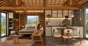 A modern interior with a bed, a dining area, and a kitchen. - Estância 3 por 1 (Guaratuba)