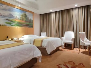 A hotel room with two beds, a painting, a large window with curtains, and a chair. - Vienna Hotel (Weihai)