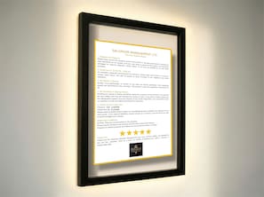 A framed document titled 'SALVADOR MANAGEMENT LTD The Five Golden Rules' with guidelines for guests. - Elegant Studio Leicester l Orthopedic Mattress (Leicester)