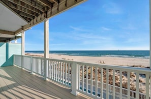 A wooden deck with white railings overlooking a beach. - Gulf-Front Luxury - 7BR - Salt Water Pool - Sleeps 22 (Gulf Shores)