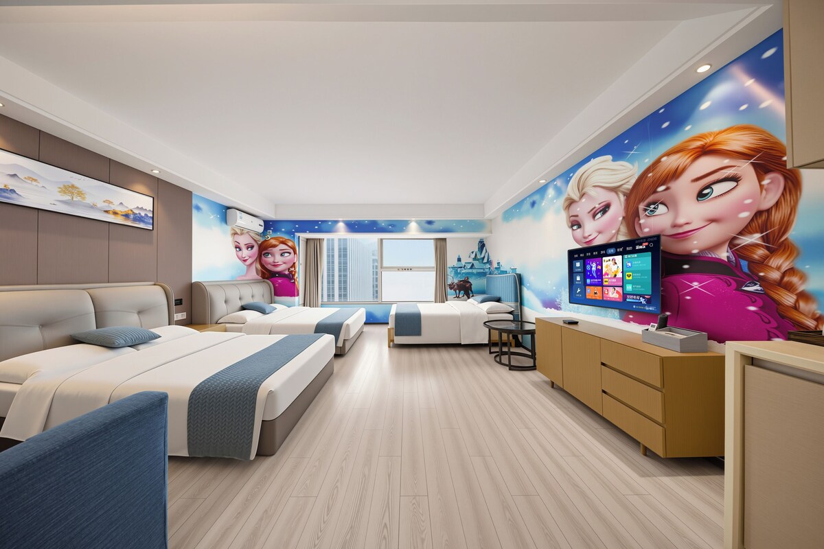 Ein modernes Schlafzimmer mit einem großen Bett, einem kleineren Bett, einem Schreibtisch und einem Fernseher.