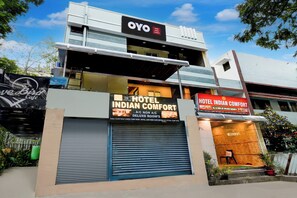 A hotel named 'Hotel Indian Comfort' with a signboard advertising A/C and Deluxe Room's. - Hotel O by OYO Indian Comfort (Hyderabad)
