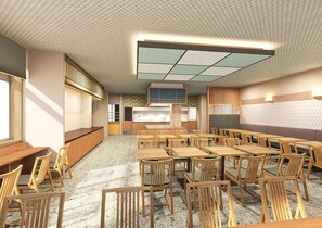 A spacious dining area with multiple wooden tables and chairs, a high ceiling with a geometric pattern, and a kitchen area in the background. - Natural Hot Spring Matsubara no Yu (Rikuzentakata)