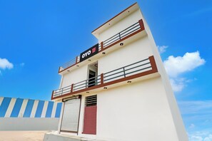 A hotel building with a sign reading 'OYO Hotel Little Star'. - Hotel O Little Star (Hasanganj)
