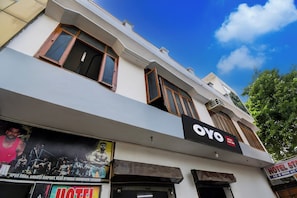 A hotel with a signboard for 'OYO Hotel Stay Inn' and a visible entrance. - HOTEL O STAY INN (Lucknow)