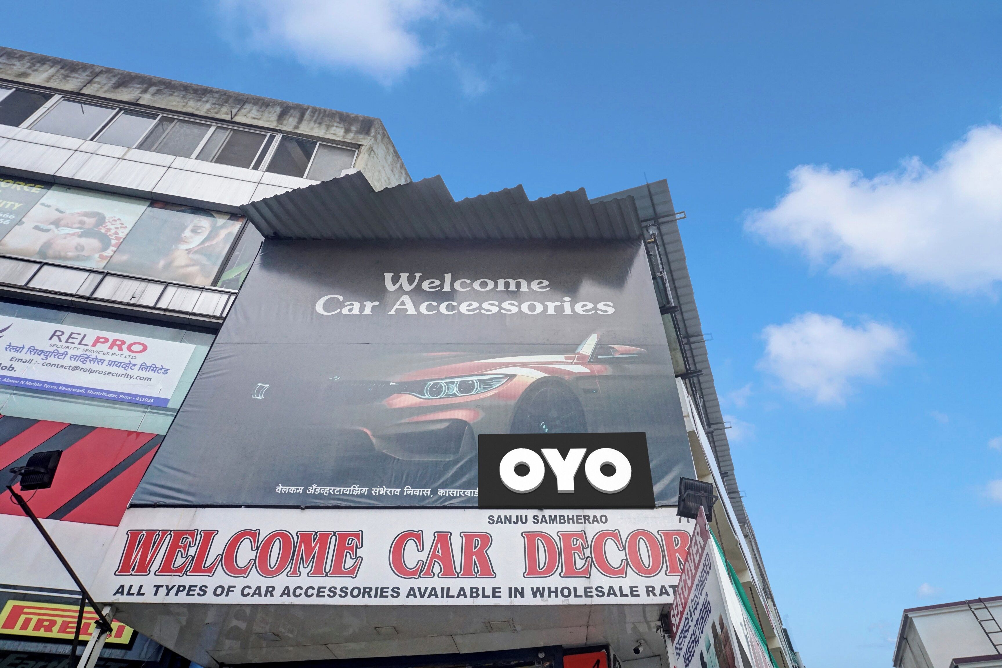 A building with a large sign advertising car accessories.