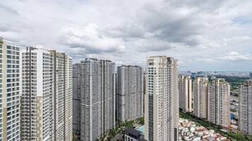 A high-rise residential area with multiple apartment buildings, roads, and greenery.