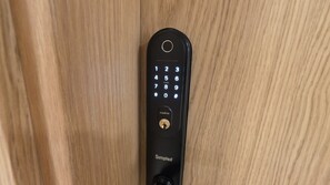 A black Simplified brand door lock with a numeric keypad and a Hallmark keyhole. - The greatest stay in Gibraltar (Gibraltar)