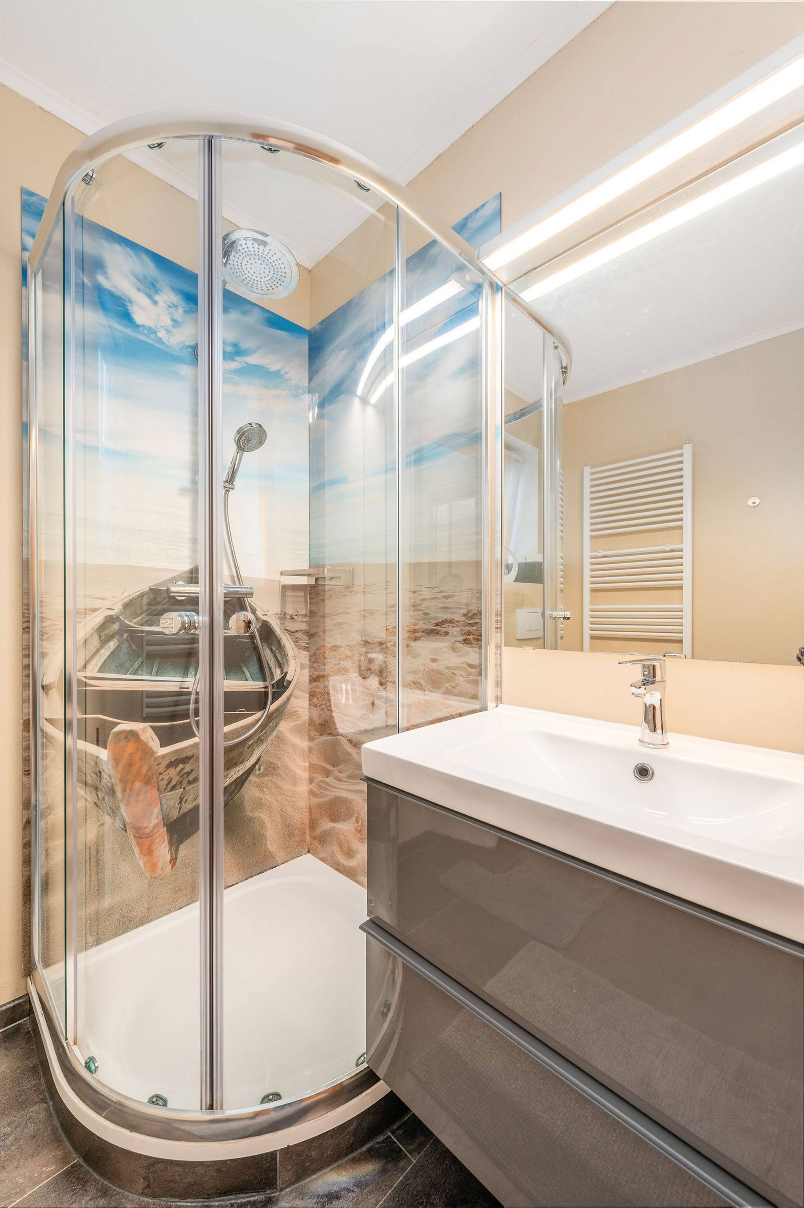 A bathroom with a glass-enclosed shower, a bathtub, and a vanity with a mirror.