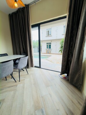 Dining - Poolside Retreat Trou aux Biches – Ground-Floor Apartment with Pool Access (Triolet)