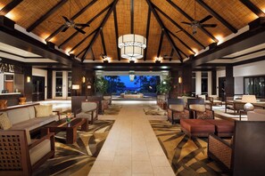 A spacious lobby with a high ceiling, multiple seating areas, and a view of the outdoors. - Westin Ka'anapali Ocean Resort Villas, 1 Bdrm Premium Oceanview Villa (Lahaina)