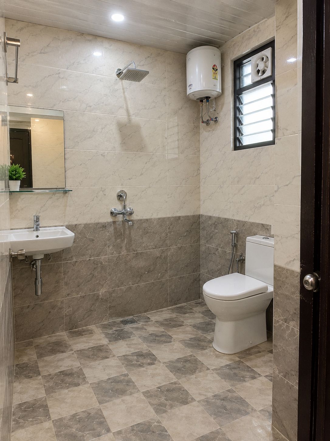 A bathroom with a shower, toilet, sink, and a mirror.
