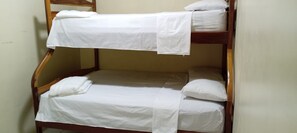 A bunk bed with white bedding and pillows. - New Listing (Salinas)
