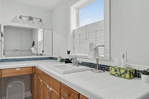 A modern bathroom with a double sink, a large mirror, and a window. - Riverlight - Nehalem Riverfront for 2 (Nehalem)