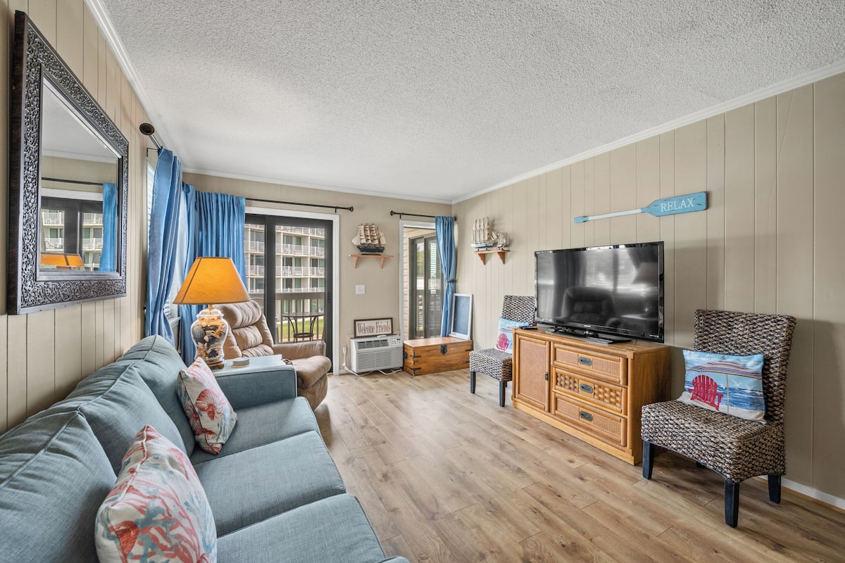 Basic Condo, 2 Bedrooms, Balcony, Partial Ocean View (202E) | Living area | TV