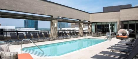 Outdoor pool, a rooftop pool, sun loungers