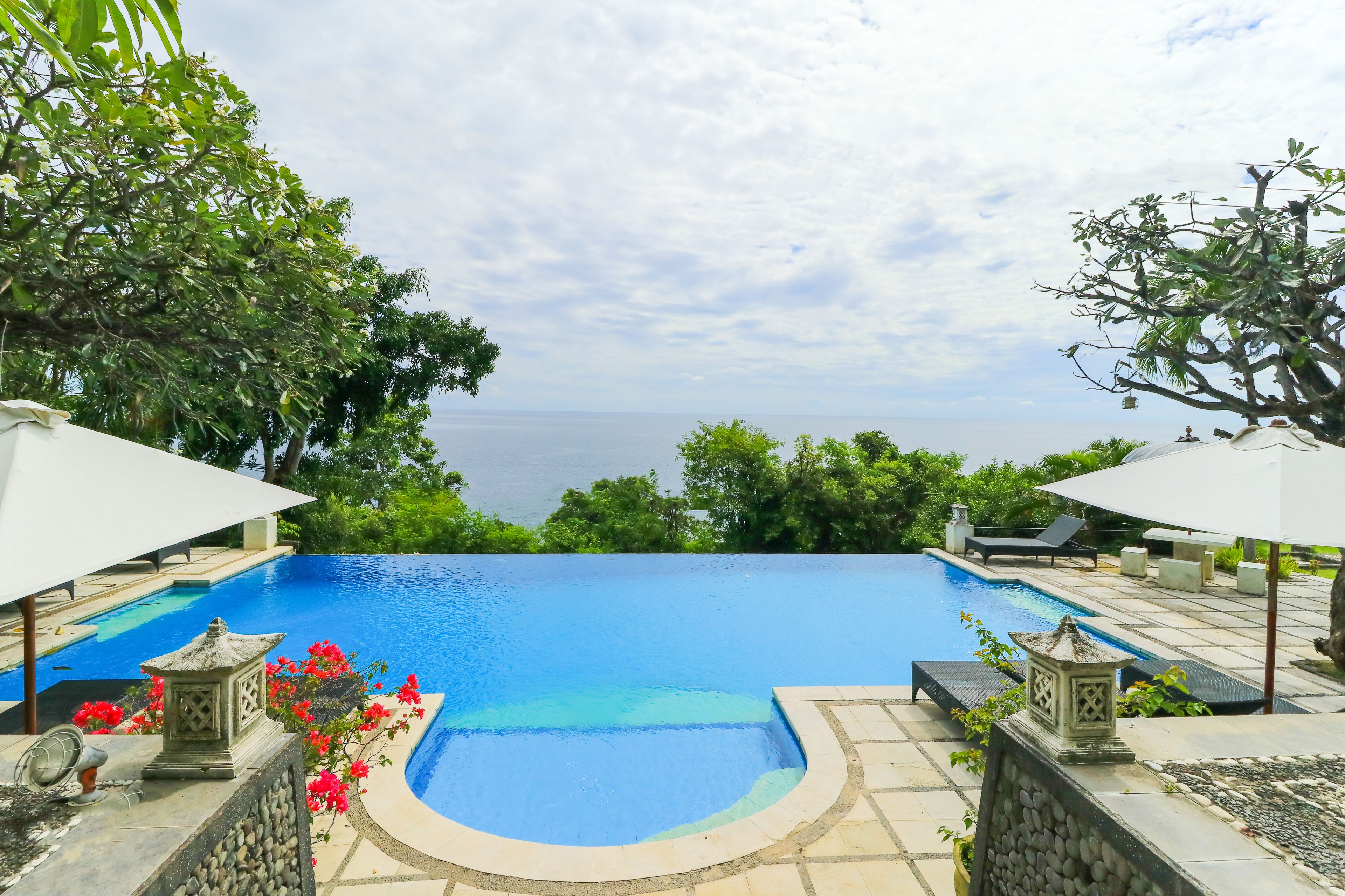 outdoor pool, pool umbrellas, pool loungers