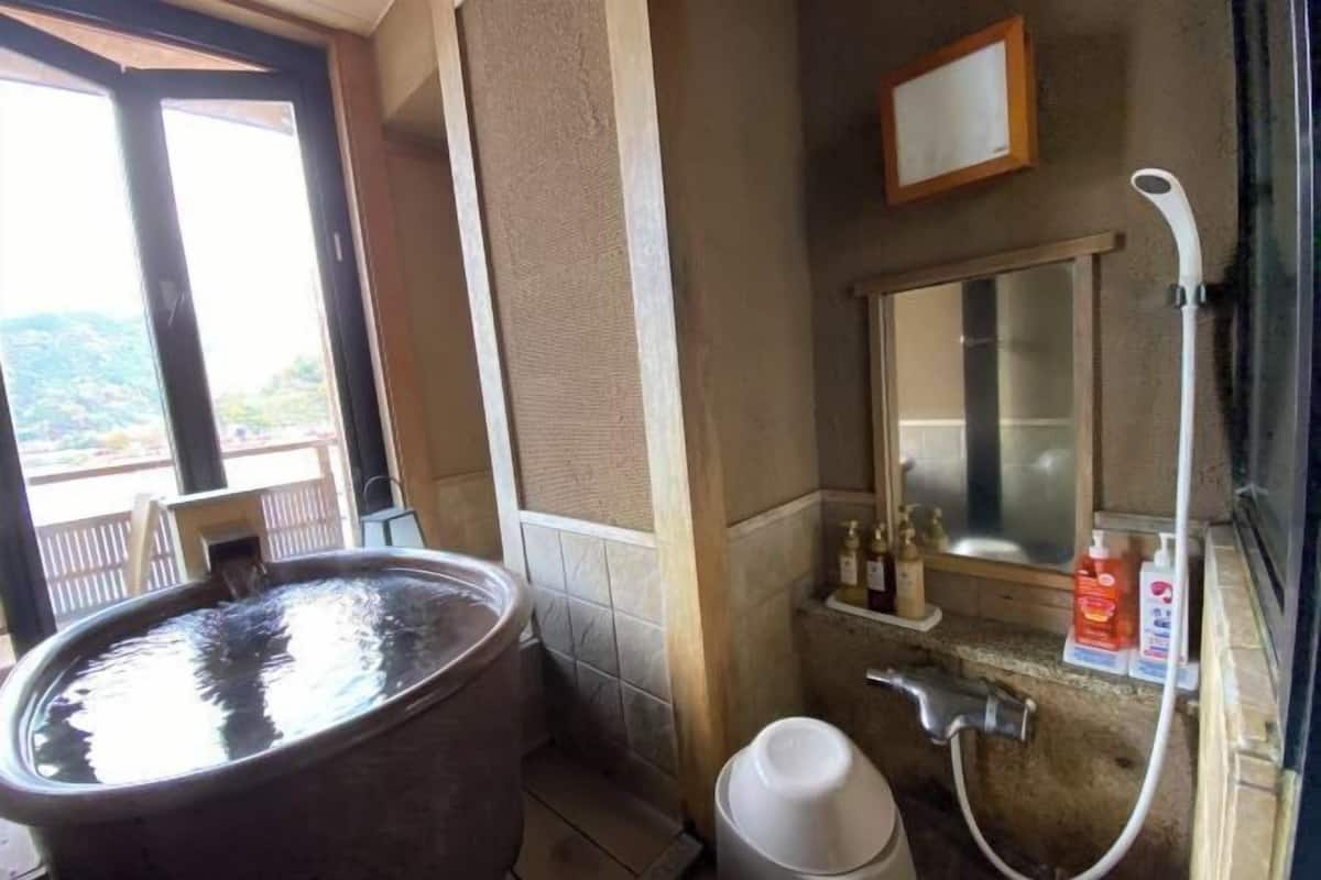 Bathroom | Free toiletries, hair dryer, slippers, bidet