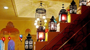 A staircase with ornate lanterns and a chandelier. - Moroccan Holiday Suite (Hualien City)