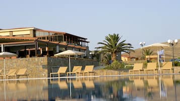 Outdoor pool, pool umbrellas, pool loungers