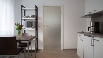 Apartment, Balcony (C) | In-room dining