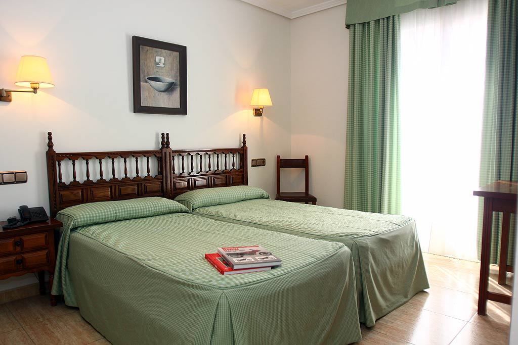 desk, blackout curtains, free cots/infant beds, free wifi