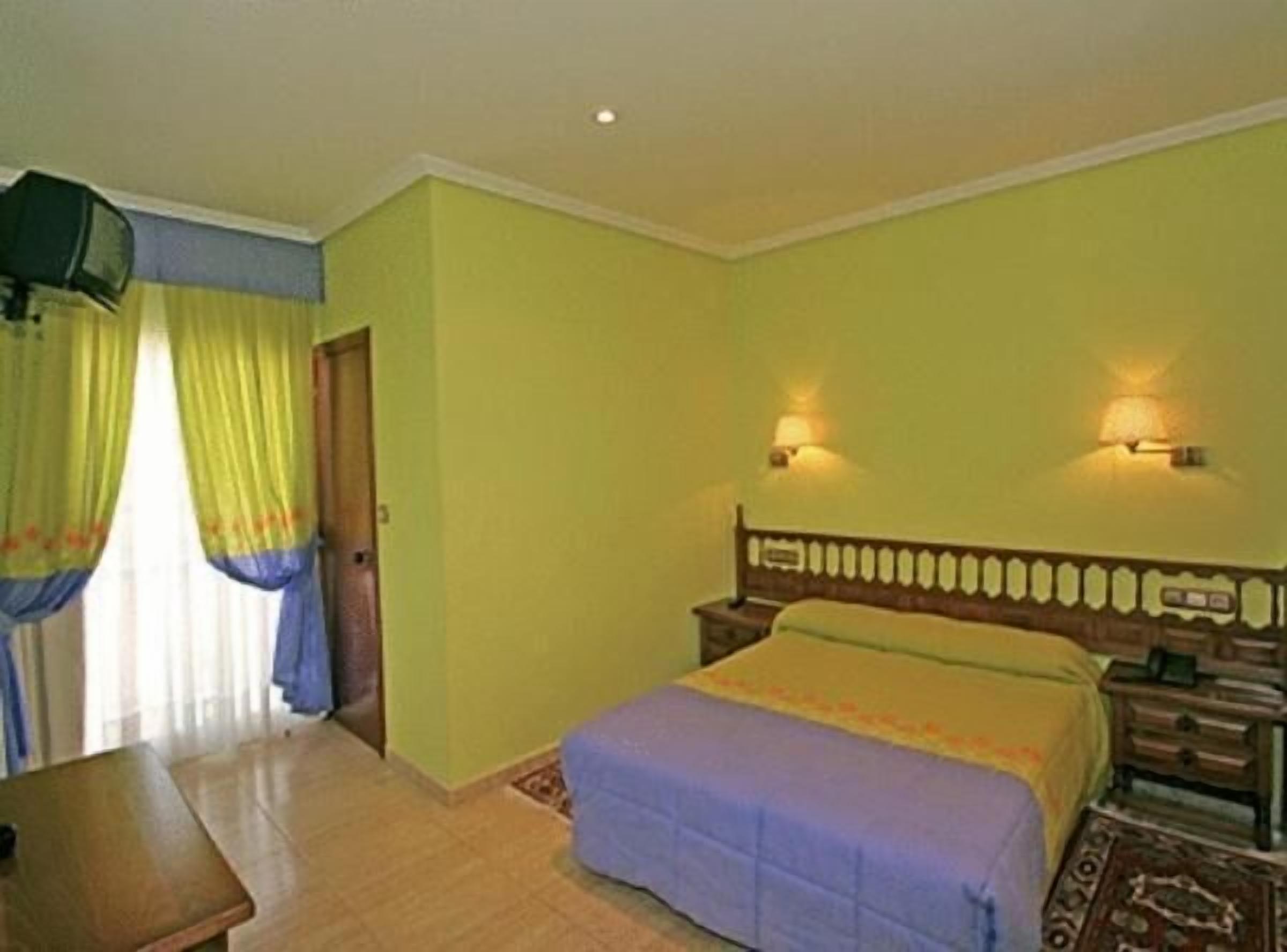 desk, blackout curtains, free cots/infant beds, free wifi