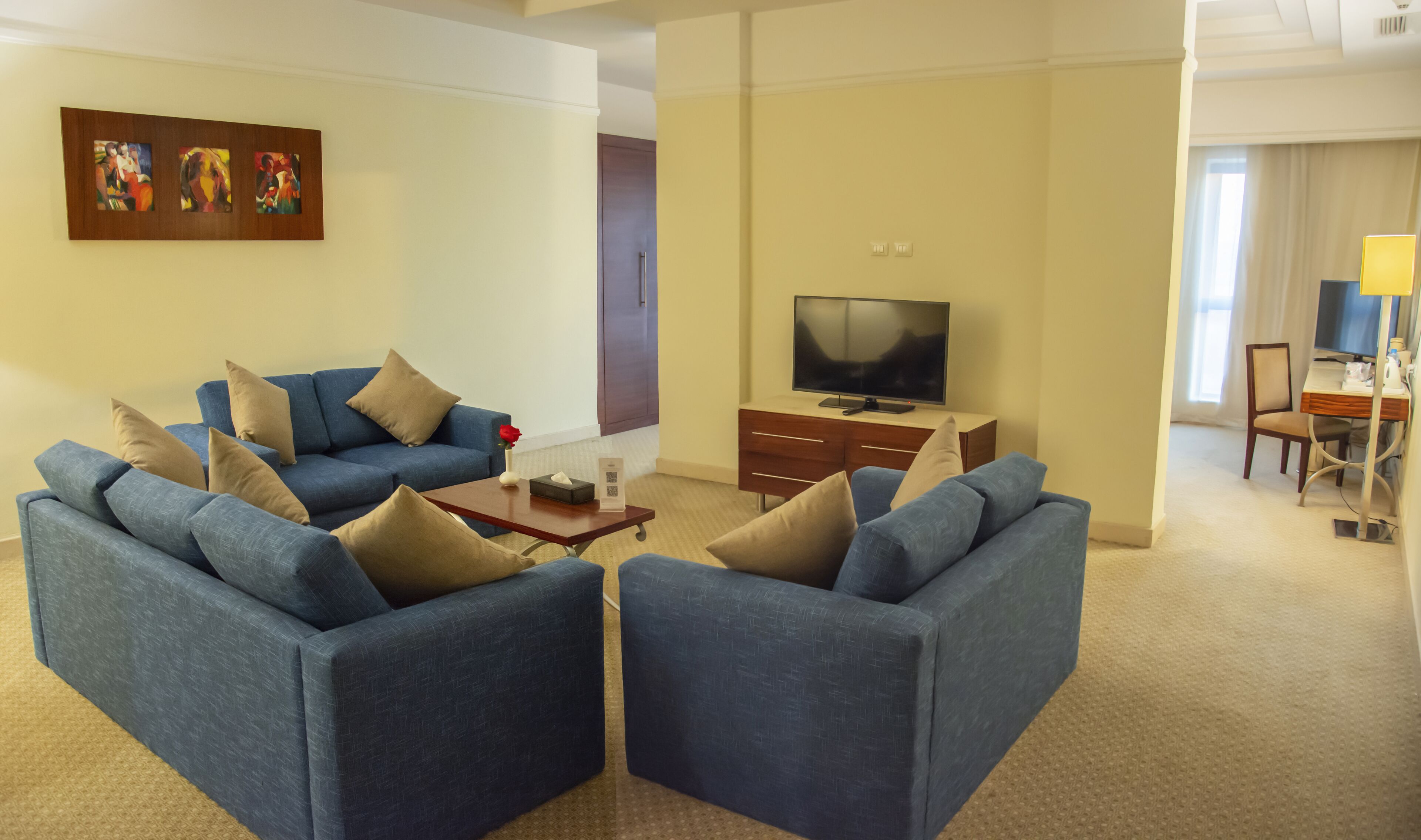 junior studio suite, city view | living area | 42-inch led tv with satellite channels, tv